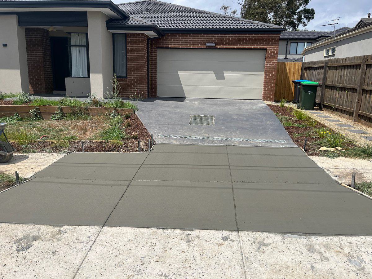 New-build driveway running out to the council crossover and footpath